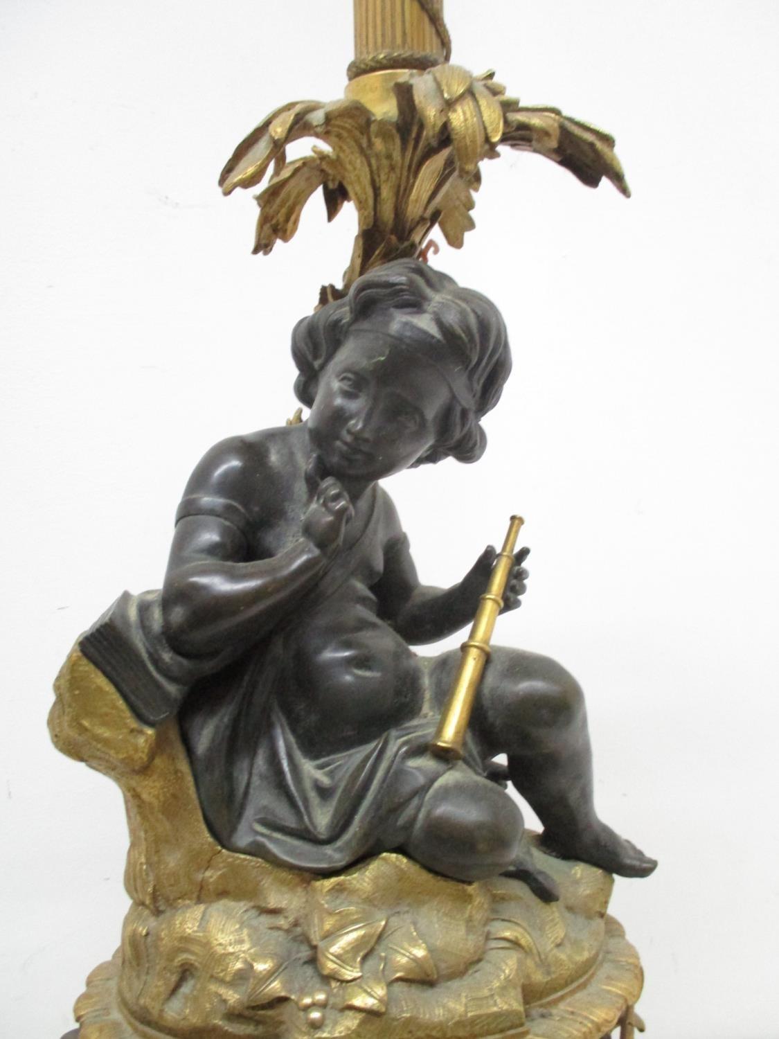 A late 19th century gilt and patinated bronze lamp base, fashioned as a young girl holding a - Image 3 of 9