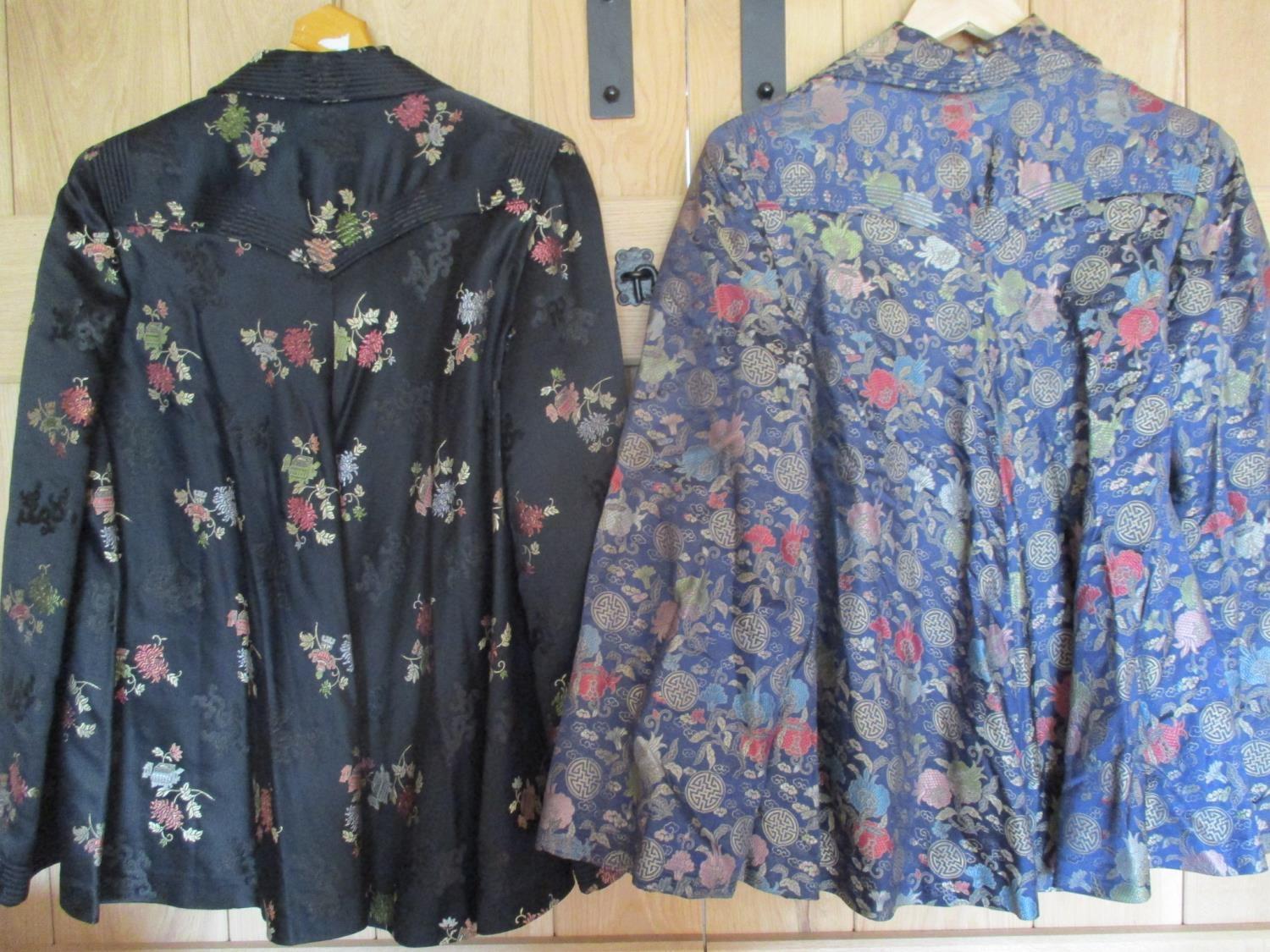 Two mid 20th century Chinese embroidered silk jackets in colourful flowers and pagoda designs, - Image 3 of 3