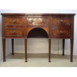 An early 19th century mahogany sideboard with original and later marquetry and a crossbanded top,