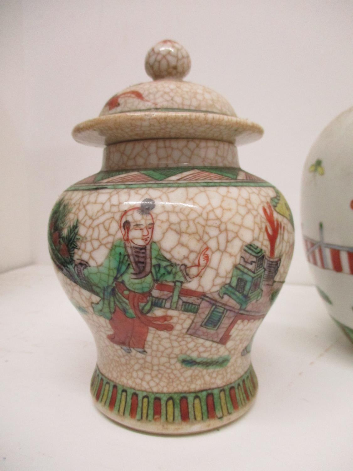 Japanese ceramics to include an Imari blue and white ginger jar decorated with figures and a crackle - Image 2 of 5