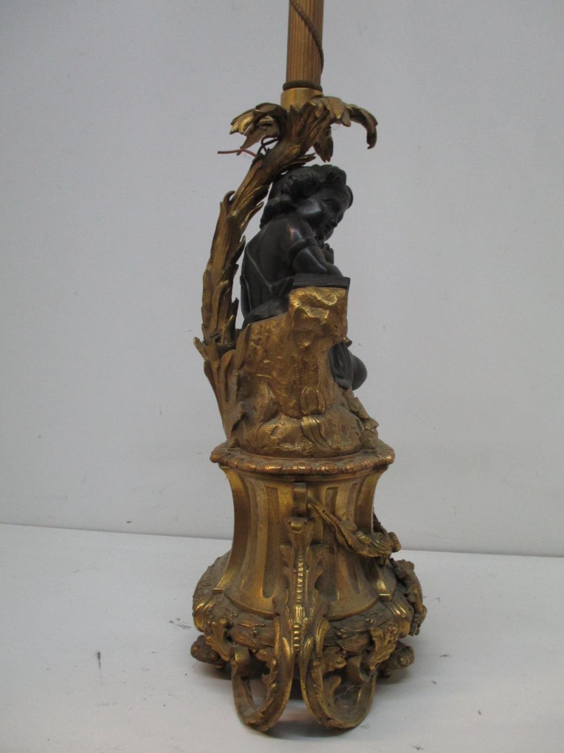 A late 19th century gilt and patinated bronze lamp base, fashioned as a young girl holding a - Image 7 of 9