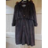 A V2 by Versace ladies dark brown soft leather over -sized storm coat, with pull in waist and faux