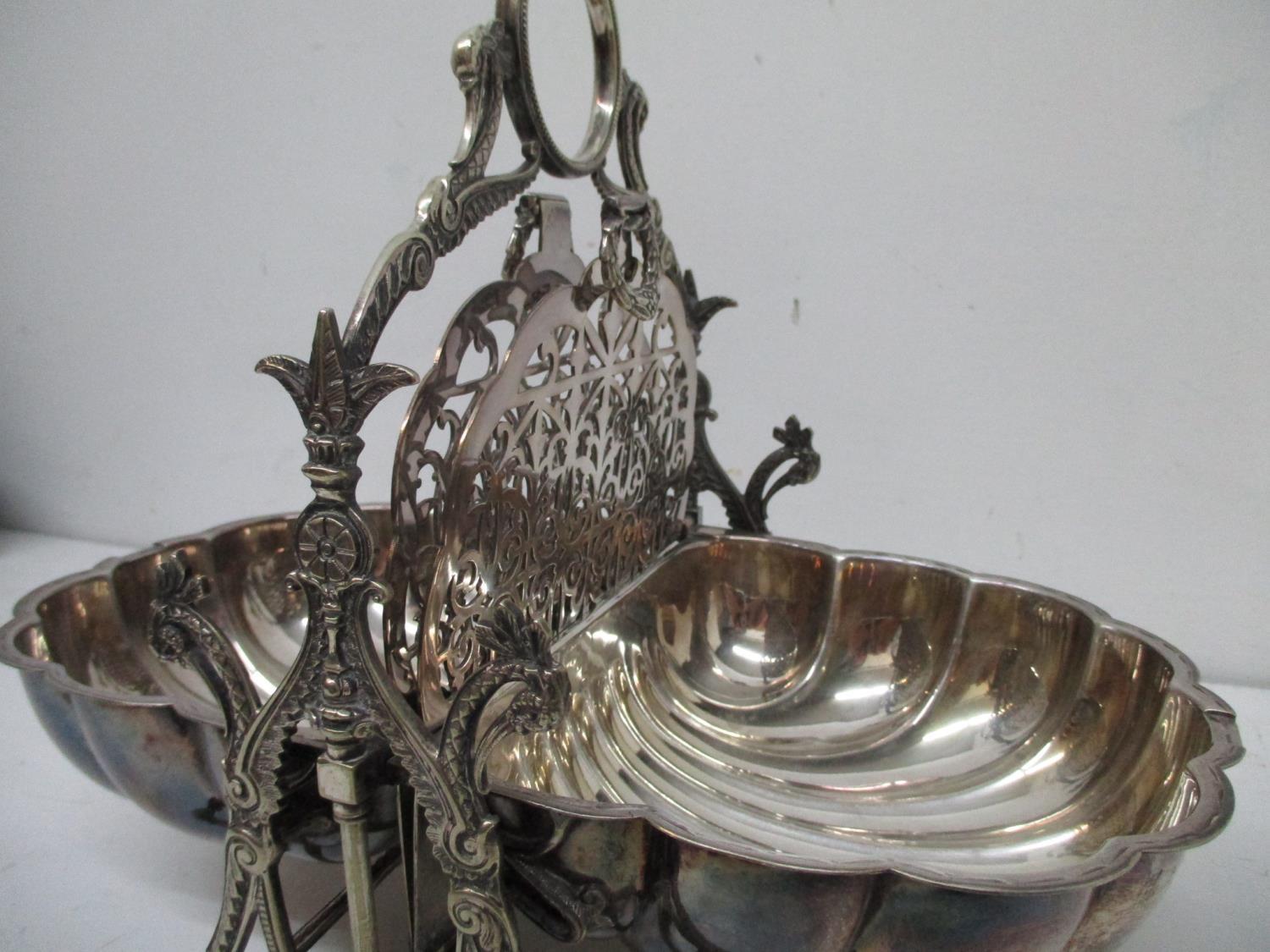 A Victoria silver plated biscuit box with a ring, bird head and scrolled handle, over twin scalloped - Image 5 of 5