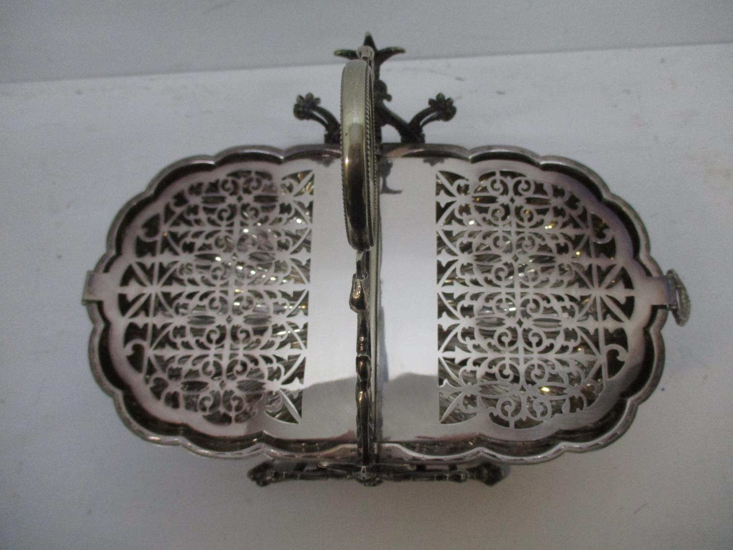 A Victoria silver plated biscuit box with a ring, bird head and scrolled handle, over twin scalloped - Image 4 of 5