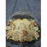 An early to mid 20th century tapestry evening bag with silver framed clasp depicting windmills and