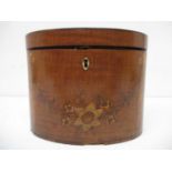A George III Sheraton satinwood and marquetry oval tea caddy with a hinged lid enclosing a paper