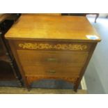 An early 20th century oak sewing chest on castors and contents to include cotton reels, buttons,
