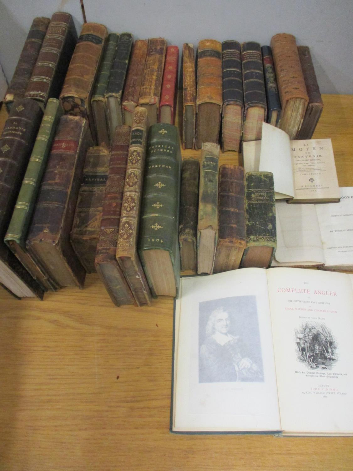 A quantity of antiquarian leather bound books to include an 1889 The Complete Angler, an 1863 Rob