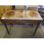 An early 19th century mahogany side table having an inlaid top, single drawer and tapering legs, 28"