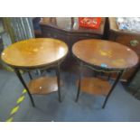 A pair of reproduction French Louis XV style, two tier oval topped occasional tables having gilt