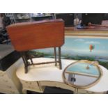 Edwardian mahogany Sutherland table and a gilt framed oval wall mirror