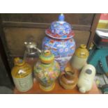 A mixed lot to include advertising stoneware flagons, Doulton Lambeth jug and other items