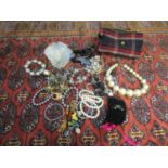 A small quantity of costume jewellery to include beaded bracelets Location: CAB