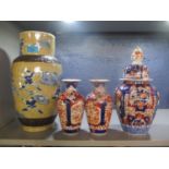 Four Japanese vases to include a crackle glazed vase and three Imari vases