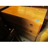 A prime four drawer chest of drawers with brass inset ring handles, and a pine low chest of two