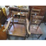 A set of four Regency country dining chairs and one carver