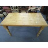 A pine kitchen table on turned legs, 30 2/5" x 54" x 29 2/8"