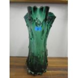 A continental green glass flower vase