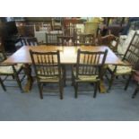 An oak refectory style dining table on bulbous columns and splayed feet, 29 2/8" x 72 2/8" x 30 3/8"