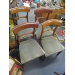 A set of four Regency mahogany bar back dining chairs