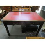 A stained oak writing desk with inset red scriber, two frieze drawers on square legs, 29 5/8" x