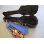 A Gator hard shell acoustic guitar case and a cased violin A/F