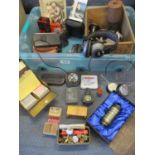 A mixed box of collectables including miners lamp, vintage electric razors, hand-warmers and other