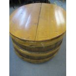 A large pine and coppered barrel design coffee table/chest