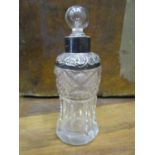 An Edwardian cut glass scent bottle with embossed silver collar, London 1910, maker J M W & Son Ltd
