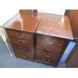 A pair of early 20th century mahogany four drawer pedestal tables, 24 1/2" h x 14"w