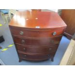 An early 20th century mahogany small bow fronted chest of drawers. 30" h x 24"w