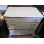 A selection of French white painted bedroom furniture consisting of chest of drawers, two bedside