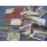 Early 20th century postcards within twelve postcard books from Belgium and France from the 1920s and
