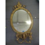 A Victorian Girandole gilt wall hanging mirror having two candle sconces, 38" h x 21 1/4"w