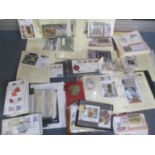 A large quantity of First Day covers and stamps to include The Royal Family, Railways and World