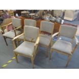A set of five mid 20th century Gordon Russell teak chairs, three being carvers