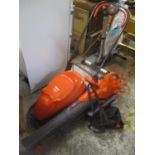An electric Easi Glide 300 Flymo and a vac/blower