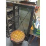 A Victorian walnut low octagonal topped games/sewing table, together with an early 20th century