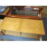 A modern yew two tier coffee table, together with a light oak low open cabinet