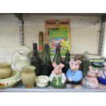 A mixed lot comprising Retro Commando and other comics, vintage glass and terracotta bottles,