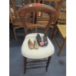 A pair of 19th century child's shoes and treen lasts, together with a child's high chair in mahogany