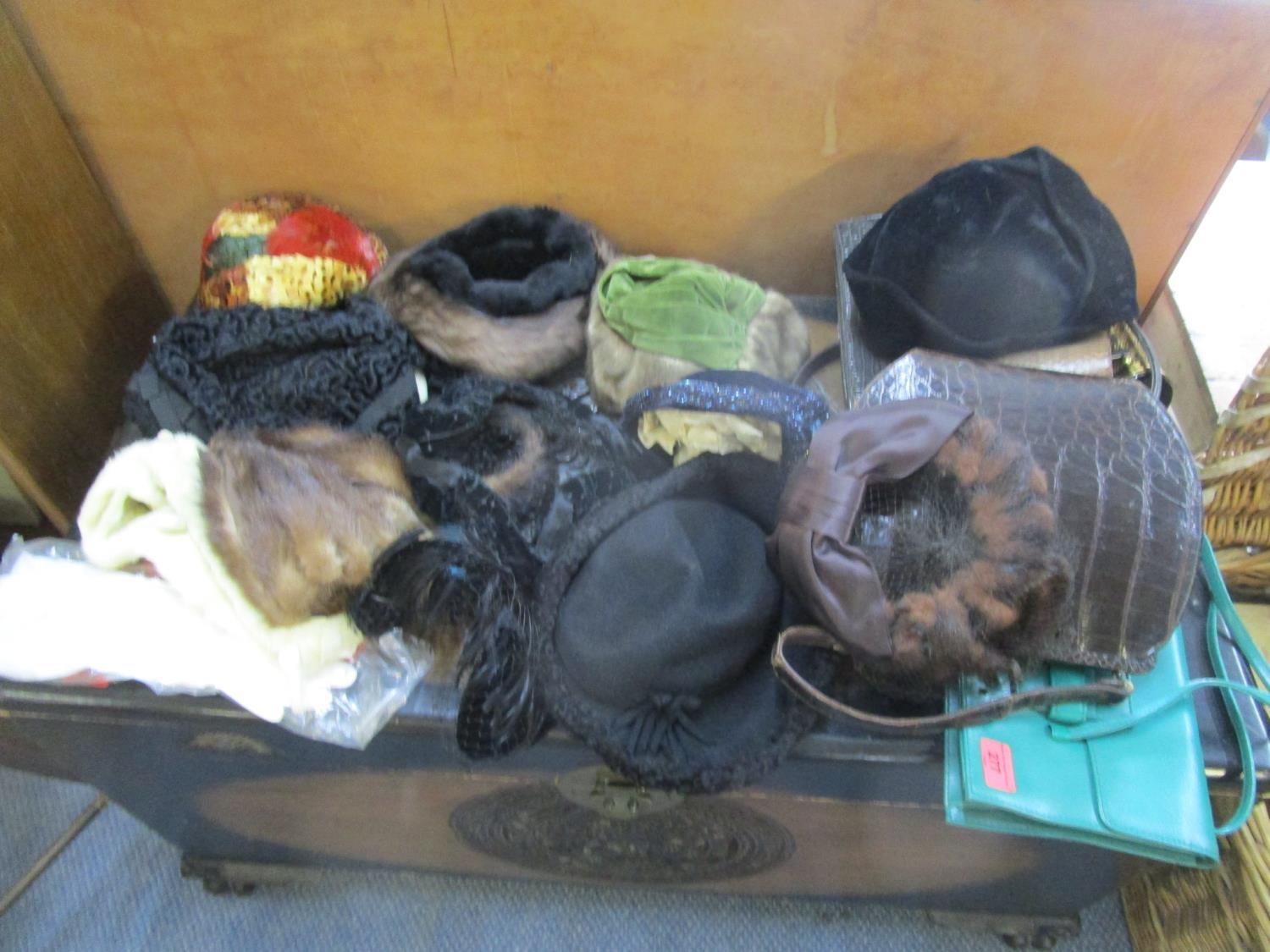 A selection of fashion accessories to include vintage handbags, hats and gloves