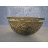 A Chinese brass bowl having engraved continuous band of dragons, hills and a bird in landscape below