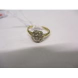 An 18ct gold and illusion set diamond ring. Total weight 2.2g. Ring size 'I'