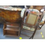 An early 20th century mahogany folding chair, together with a wall hanging shelf