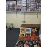 Approximately 888 CDs, a large collection of DVDs, various retro cassettes, motion gallery books and