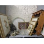 Mixed pictures to include botanical scenes, a vintage lamp, a pine wall shelf, a brown rug and mixed