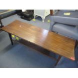 A mid 20th century two tier coffee table on four square, tapering legs, 14" h x 47 3/4"w