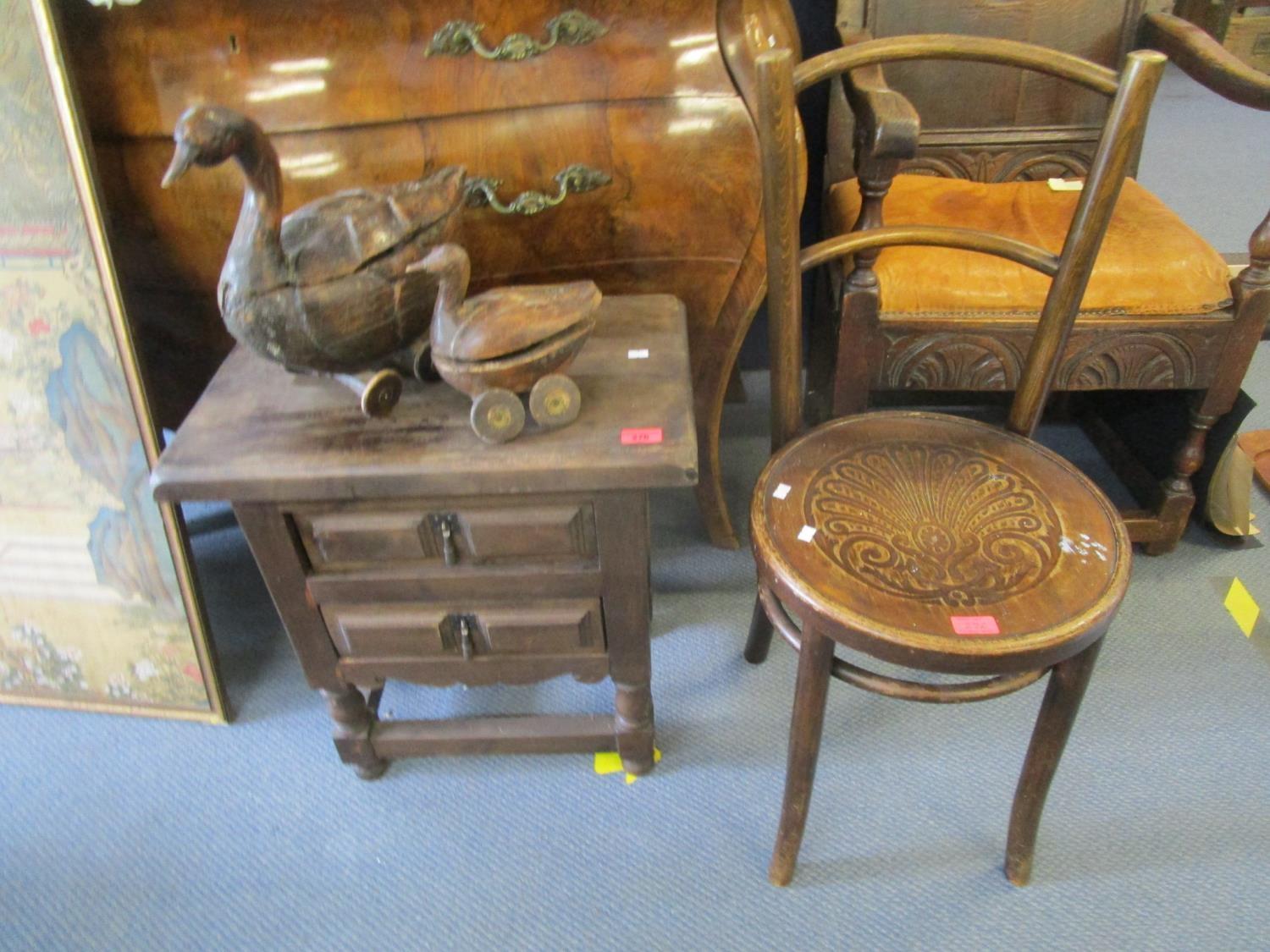 A Asian hardwood two drawer side cabinet and a Victorian penny seated chair, along with two Indian