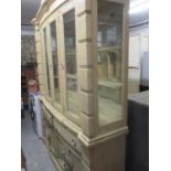 A contemporary light ash finished display cabinet, 84" x 68" x 17"